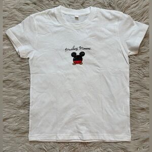 New without tags size 150 (kids 10 - 12) Mickey Mouse shirt.  Unisex.